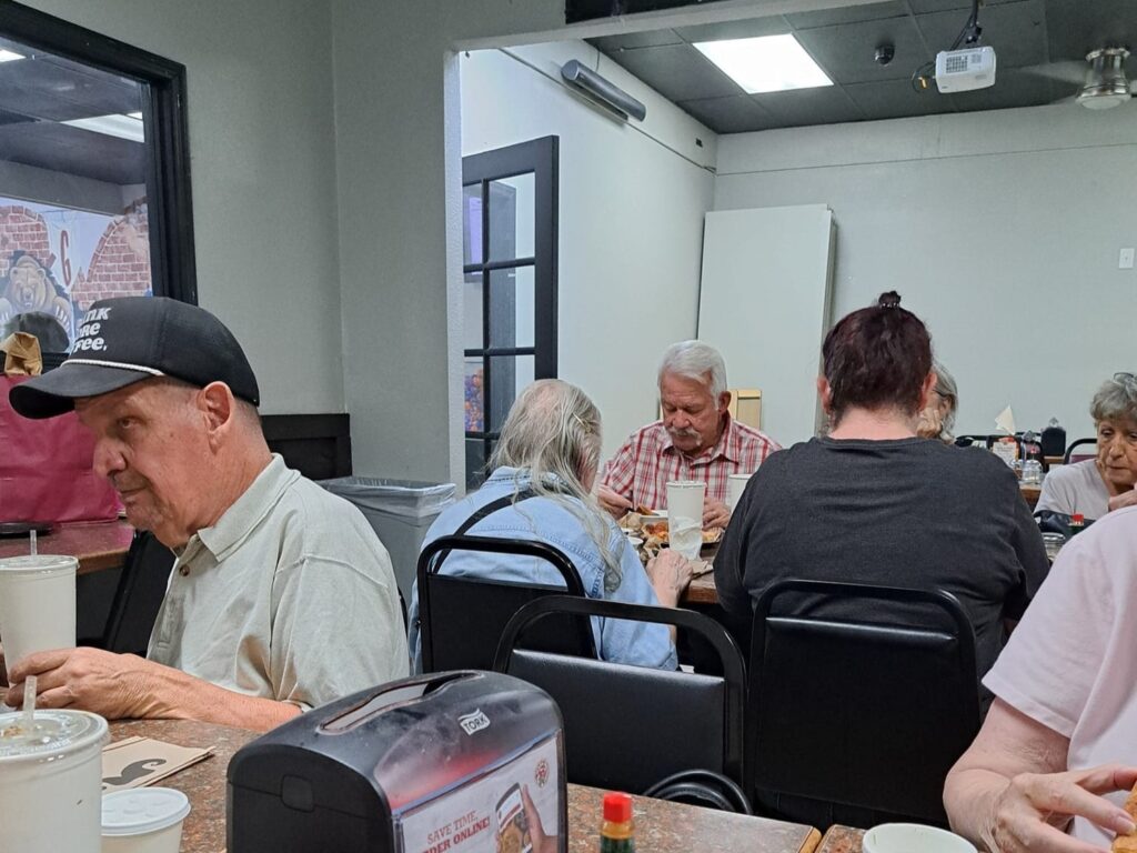 Porterville First Assembly of God Joyful Hearts Seniors enjoying a Pizza Lunch