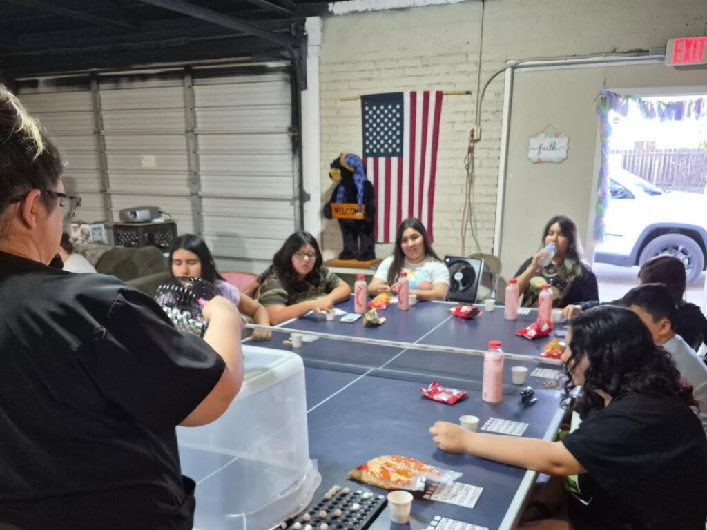 Porterville First Assembly of God Youth playing Bingo