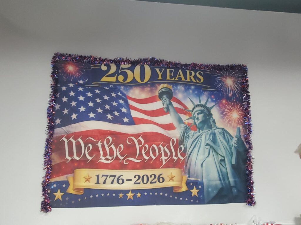 America 250 years banner at Porterville First Assembly of God Independence Day BBQ