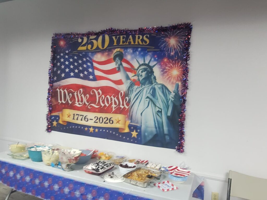 Desserts and America 250 years banner at Porterville First Assembly of God Independence Day BBQ